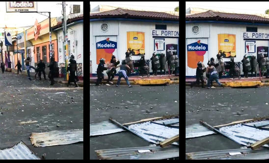Police beating people in Masaya Police beating people in Masaya